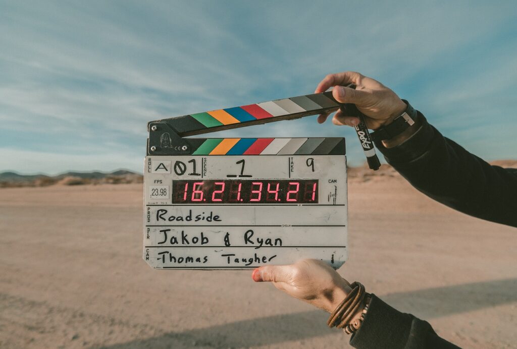 Clapperboard marks the beginning of a scene, symbolizing the start of AI-driven media innovation